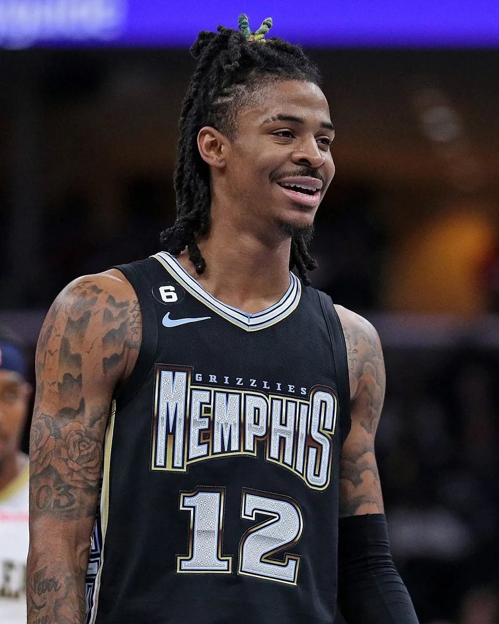 Ja Morant has a distinctive sense of fashion with long dreads and arms filled with tattoos
