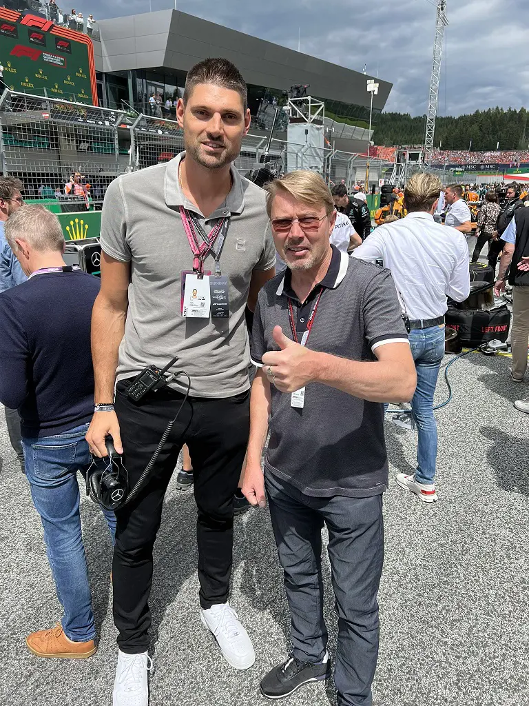 Nikola posed with former Finnish racing driver Mika Hakkinen (on his left)