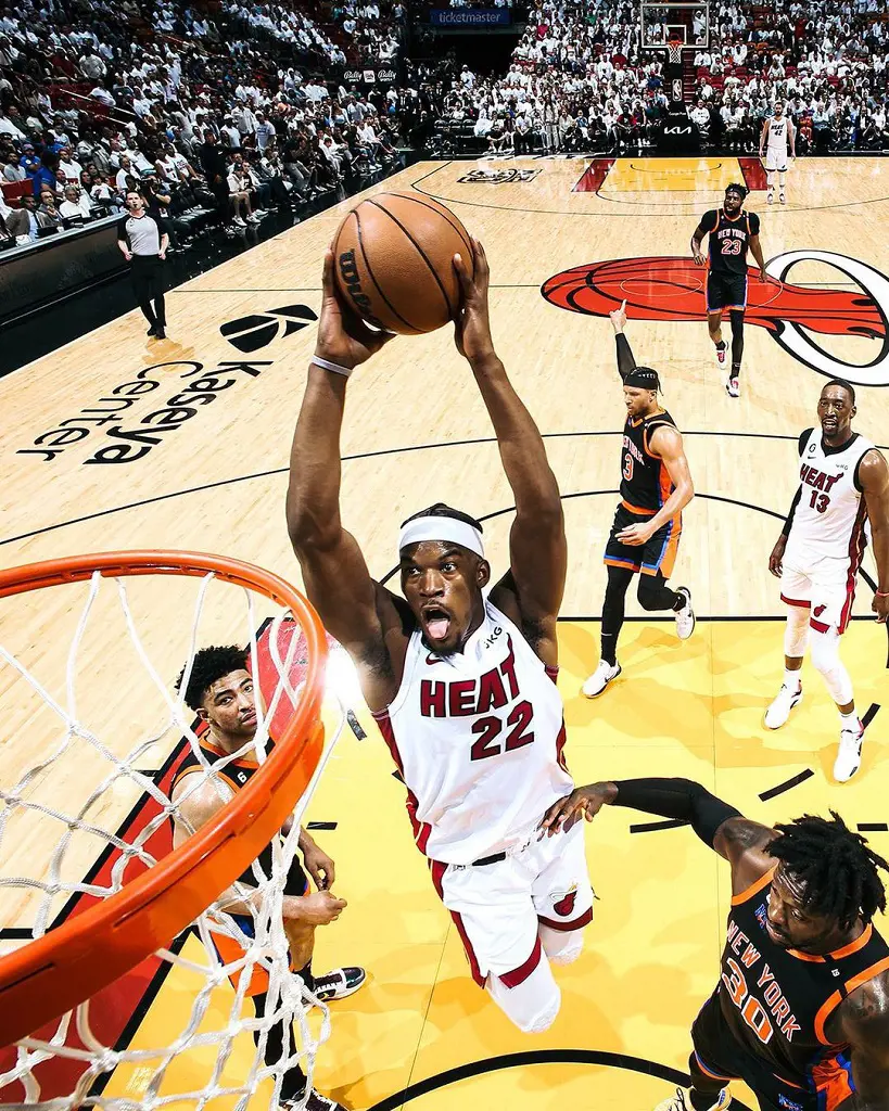 The Heat athlete attempting to score a basket at their home basketball court on May 3