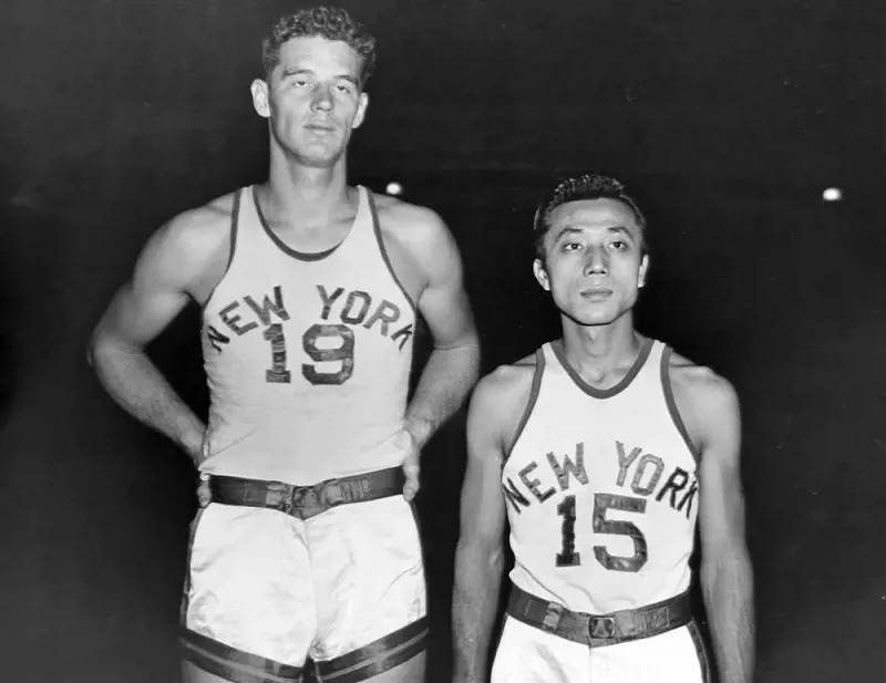Wat Misaka was the first person of color to play in the NBA, Misaka to the right